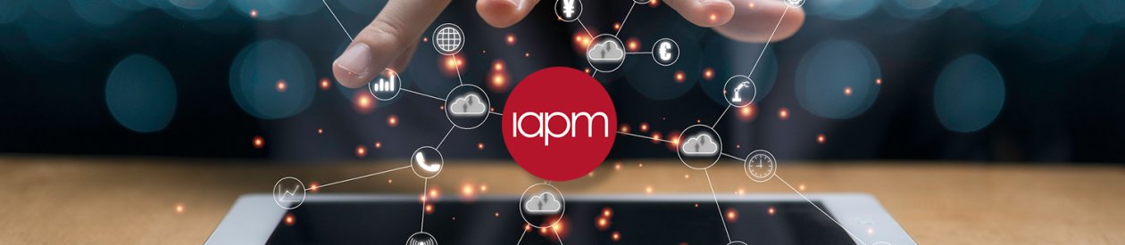 A person holds their open hand over the IAPM logo and digital symbols. A person holds their open hand over the IAPM logo and digital symbols.