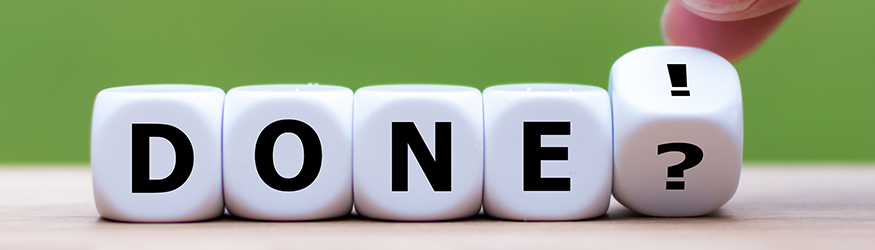 Several cubes forming the word DONE with a "!" and "?". Several cubes forming the word DONE with a "!" and "?".