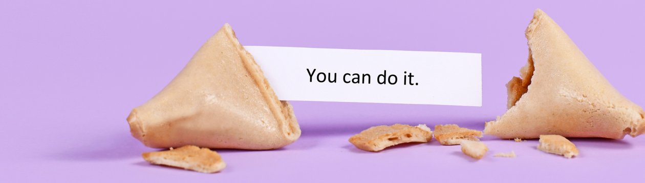 Ein zerbrochener Glückskeks. Auf dem Zettel steht "You can do it". Ein zerbrochener Glückskeks. Auf dem Zettel steht "You can do it".