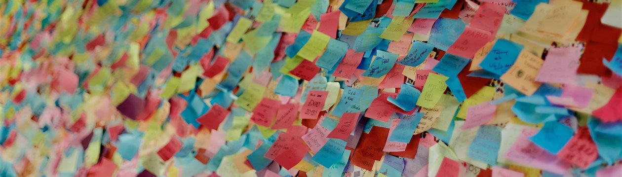 A wall full of colourful notes.
