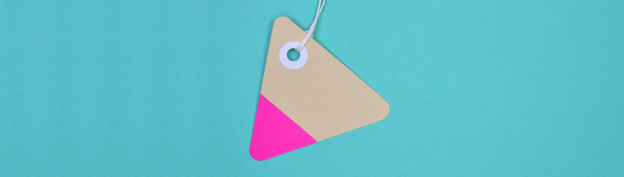 A triangular pendant on a string.