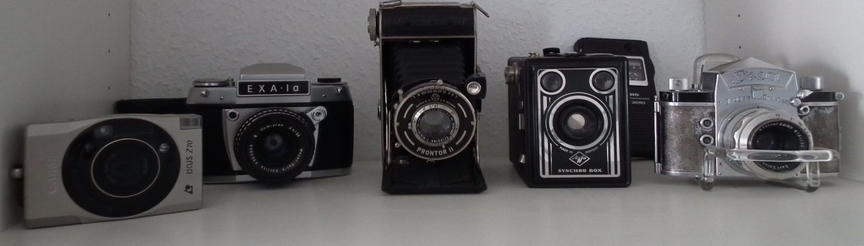 Several old cameras.